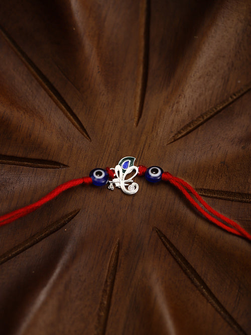 925 Silver-flute & peacock feather Rakhi for Kids
