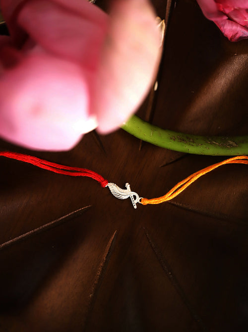 925 Silver-flute & peacock feather Rakhi for Kids