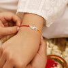 925 Silver-flute & peacock feather Rakhi for Kids