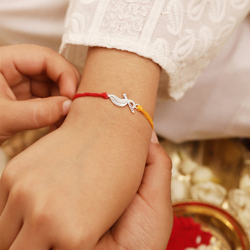 925 Silver-flute & peacock feather Rakhi for Kids