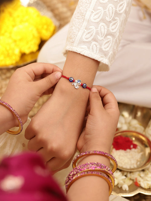 925 Silver-flute & peacock feather Rakhi for Kids