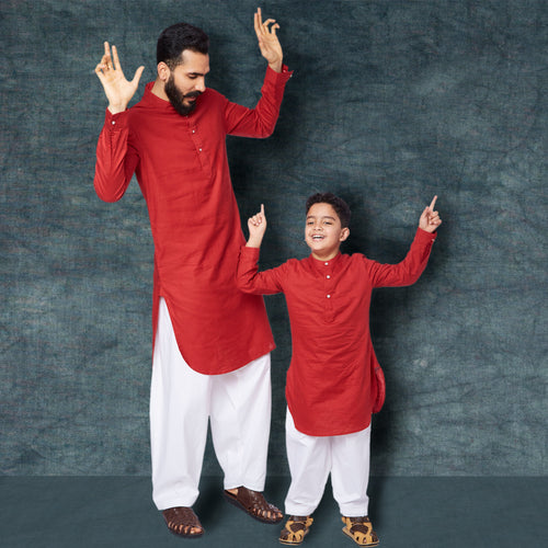 Red kurta white pyjama set for father son